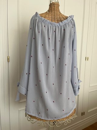 Blusa fluida de rayas con estamapado mariquitas