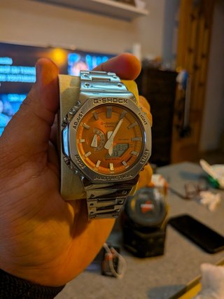 Reloj Casio G-Shock 2100 Plateado y Naranja