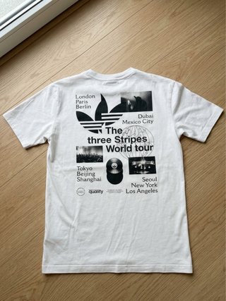 Camiseta adidas World Tour Blanca