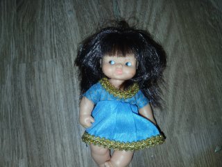 Muñeca Barriguita con vestido azul