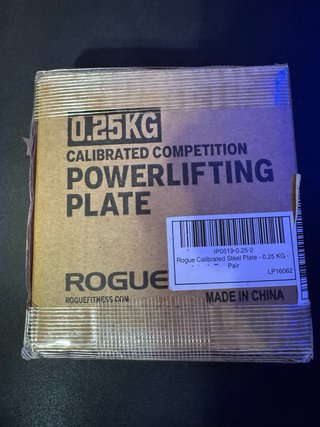 Par de Discos Calibrados Rogue 0.25kg