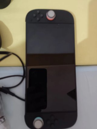 Consola Nintendo Switch2 con los juegos y el mando