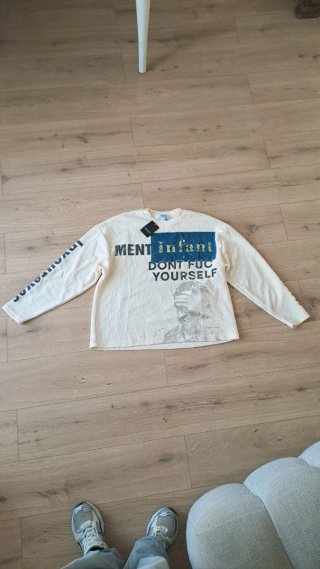 Camiseta gráfica beige