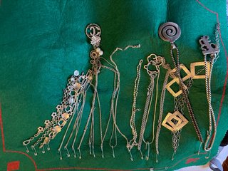 Lote de 8 collares y colgantes plateados