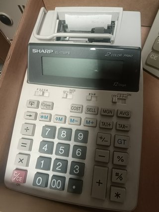 Calculadoras Sharp EL-1750 III y Texas TI-5045