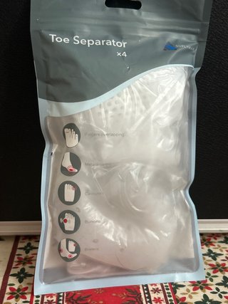 Separador de dedos de pie con almohadillas