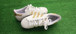 Zapatillas Adidas Superstar Blancas y Doradas