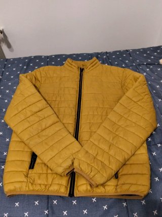 Chaqueta acolchada amarilla