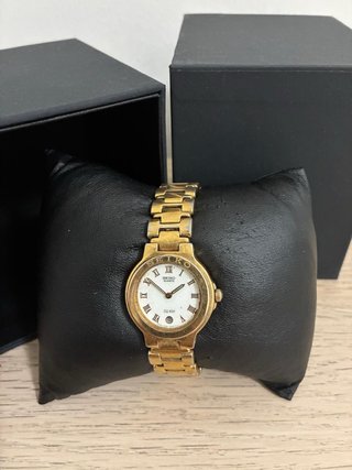 Reloj Seiko SQ 100 Vintage Dorado