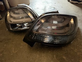 Pilotos LED negros para Peugeot 206