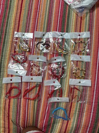 Set de 13 Pulseras para Niñas cada una a  2 euros