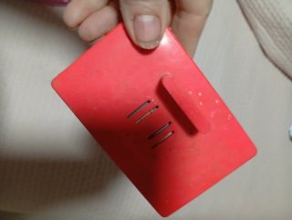 Acordeón de juguete rojo