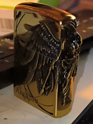 Zippo dorato Amazona