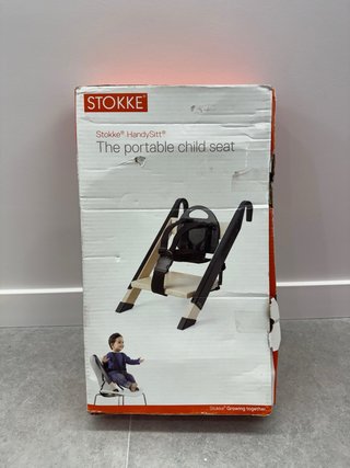 Trona Portátil Stokke HandySitt