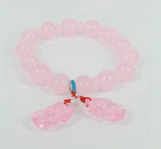 Pulsera de cristal con colgante son tres