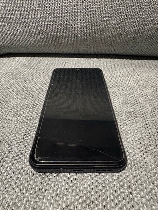 Xiaomi Redmi 9AT con funda y protector