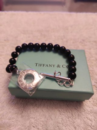 Pulsera chapada oro blanco con ónix negro