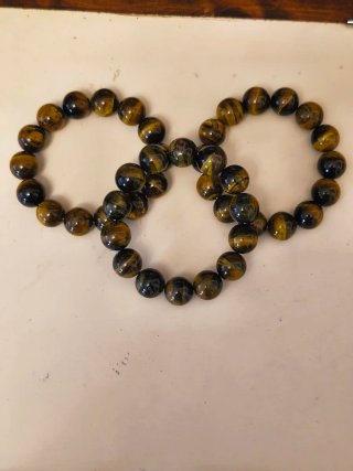 Pulsera ojo de tigre grande 12mm son tres