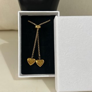 Collar con dos corazones