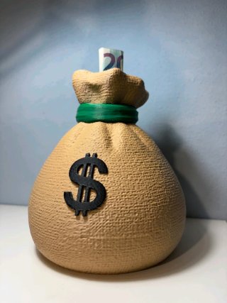 Hucha con forma de saco de dinero