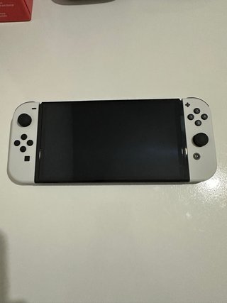 Nintendo Switch OLED Blanca + 2 juegos de Mario