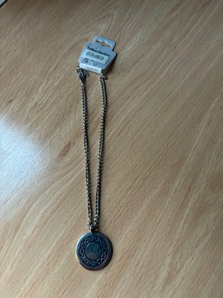 Colgante de bisutería plateado