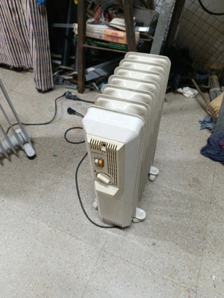 2 Radiadores Eléctricos y Humidificador