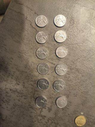 Set di 12 monete da 50 lire