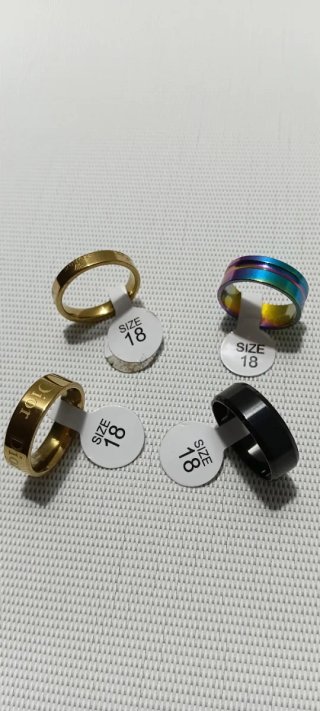 Lote 4 anillos de acero inoxidable.