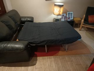 Divano letto in pelle nero