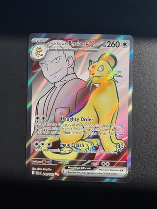 Carta Pokémon Team Rocket's Persian EX 219/182