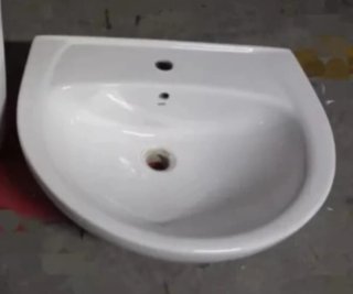 Lavabo de cerámica blanco