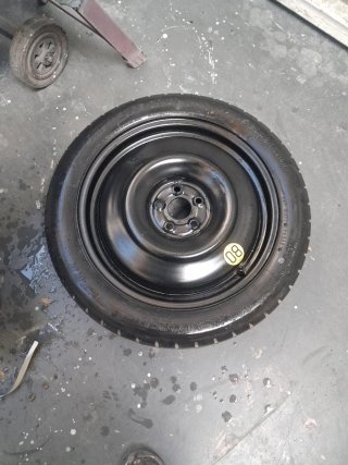 Rueda de repuesto tipo galleta