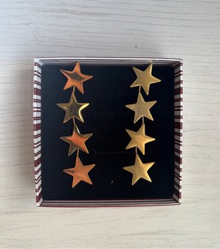 Pendientes Largos de Estrellas Doradas