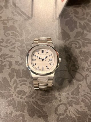 Reloj de pulsera plateado automatico