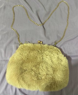 Bolso de mano con textura de pelo