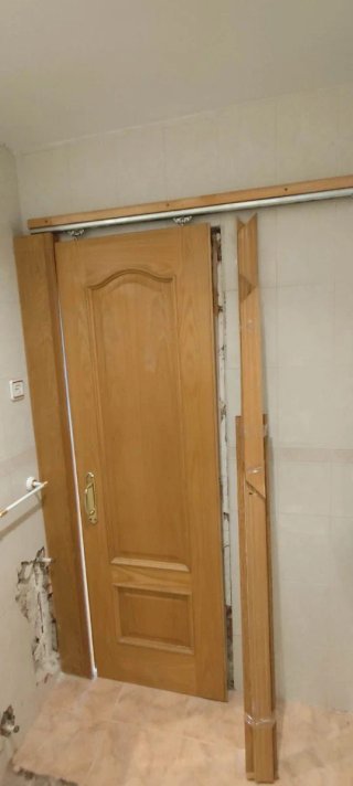Puerta corredera de madera