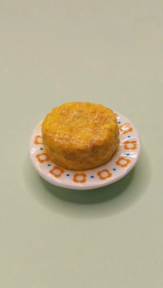 Miniatura de un Plato con Tortilla de Patatas