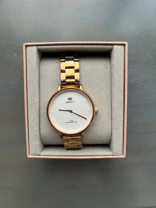 Reloj Marea Dorado rosado.