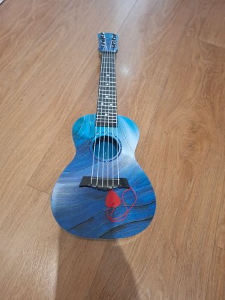 Chitarra giocattolo blu
