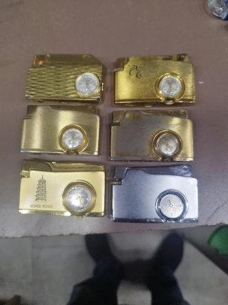 Set di 6 accendini con orologio integrato