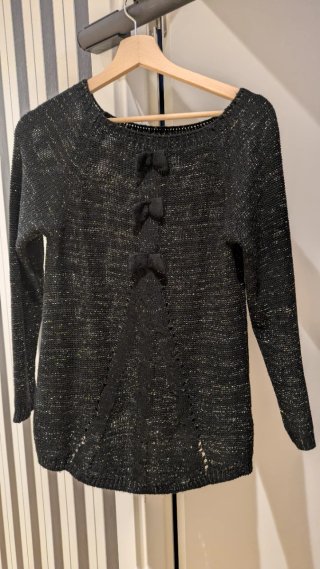 Jersey de lana negro con lazos