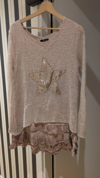Vestido rosa con detalle de estrella