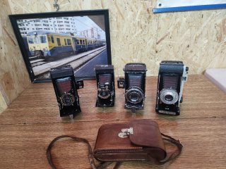 Set di 4 vecchie fotocamere a soffietto
