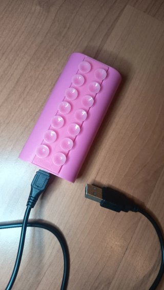 Batteria esterna rosa con ventose