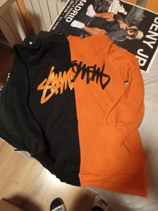 Sudadera bicolor negra y naranja