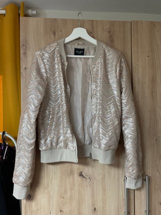 Bomber con lentejuelas beige