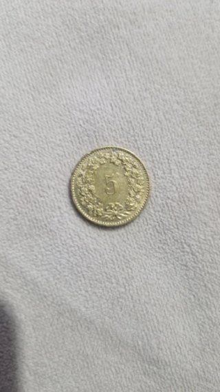 Moneda histórica de Suiza para coleccionadores.