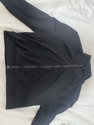 Top de manga larga negro con cremallera