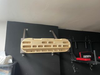 Tabla de escalada de madera con soporte
